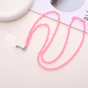 Pink acrylic crossbody phone chain with metal clasp and clear connector on white surface