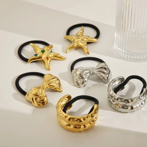Six-piece set of gold and silver metal hair ties with starfish and bowknot designs