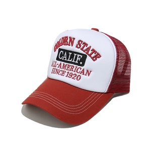 Detail of red and white mesh trucker hat with Golden State embroidery and curved brim