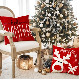 Red Christmas linen pillow covers with reindeer and winter snowflake festive designs