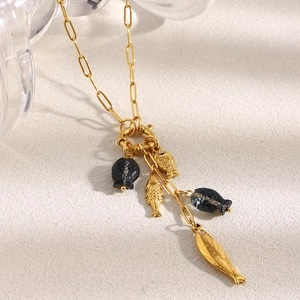 18K gold plated paperclip chain necklace with metallic and blue glass fish charms