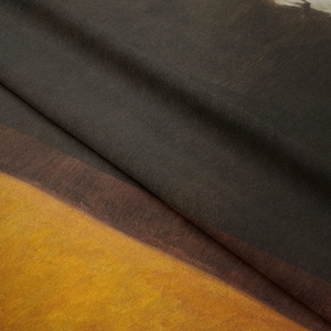 Close-up of high-quality microfiber fabric with fine suede texture and tri-color design