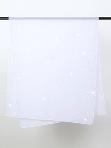 Detail of white chiffon evening shawl featuring sparkling rhinestones and elegant texture