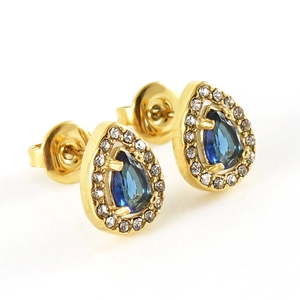 Macro view of gold stainless steel pear-shaped blue zircon halo stud earrings with butterfly back