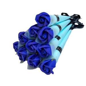 Blue soap rose bouquet in individual cone packaging with black decorative ribbons
