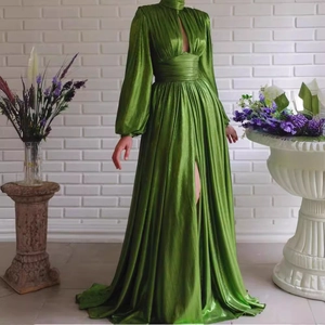 Elegant emerald green satin maxi dress with high neck cutout and lantern sleeves