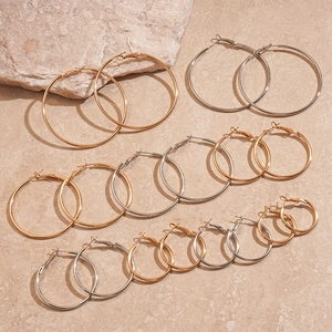 Minimalist gold and silver hoop earring set in various sizes from 30mm to 70mm