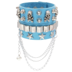 Detail of blue punk leather wide bracelet with skull studs, stars and hanging chains