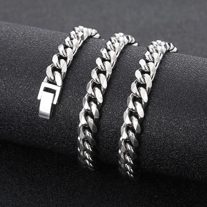 Close-up of polished silver titanium steel Cuban chain with a square clasp closure