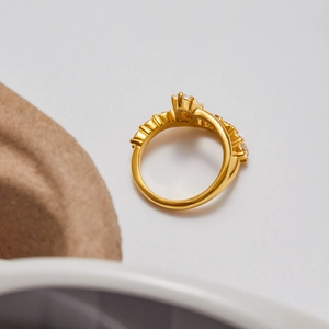 Macro shot of 18K gold plated double layer ring with marquise white zircon stones