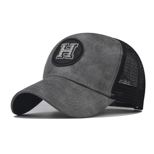Gray and black mesh trucker hat with 'H' patch shown from a 45-degree angle view
