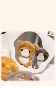 Detail of plush stuffed kittens with soft fur and realistic big eyes for cat lovers