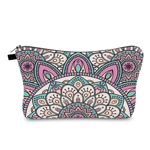 Close-up of mandala floral makeup bag with vibrant colorful patterns and a black zipper