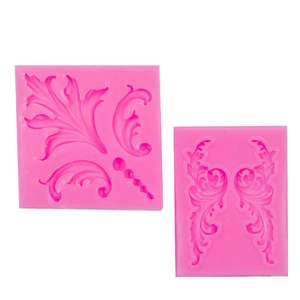 Macro detail of pink silicone lace mold with vintage European scroll relief patterns