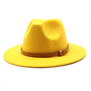 Detail of a bright yellow wool fedora hat with brown snakeskin band and gold buckle