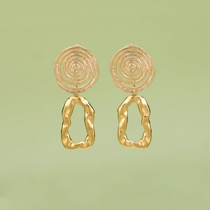 Golden spiral and geometric rectangle stainless steel earrings on light green background