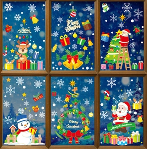 Vue détaillée des autocollants de Noël en PVC avec motifs Père Noël et flocons de neige