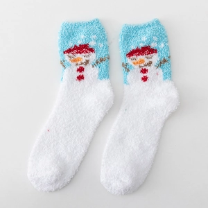 Thick coral fleece winter socks featuring a white snowman pattern on a blue background