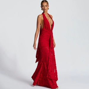 Detailed view of red deep V-neck backless dress with elegant floral texture and lace-up design