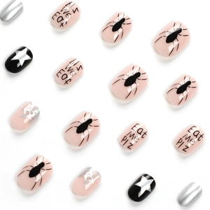 Halloween press-on nails set featuring spider webs and stars on pink and black base