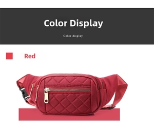 Close-up of red nylon waist bag with diamond quilted stitching and metal zipper detail