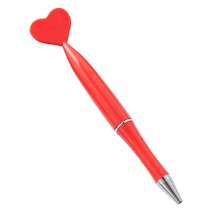 Red heart-top plastic ballpoint pen with silver accents on a clean white background