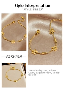 Detailed macro view of gold beaded flower bracelet with cubic zirconia on satin