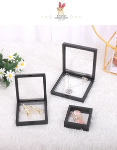 Three black PE film suspension boxes showing different jewelry items