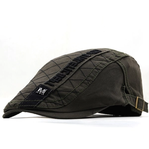 Deep green cotton ivy cap with diamond stitching and side metal buckle in 45-degree view