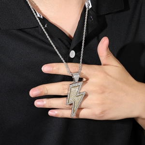 Hip hop lightning bolt pendant necklace in two-tone silver and gold with iced out diamonds