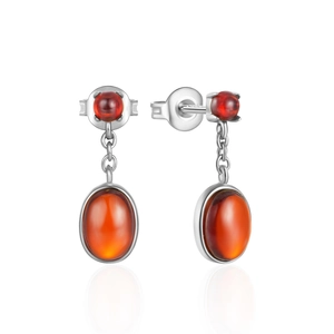Detailed view of silver drop earrings featuring elegant amber orange oval gemstones