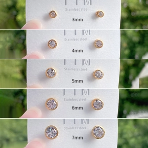 Minimalist gold plated copper stud earrings with cubic zirconia in 3mm to 7mm sizes
