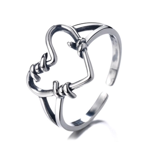 Retro S925 sterling silver hollow heart ring with adjustable thorn wire texture