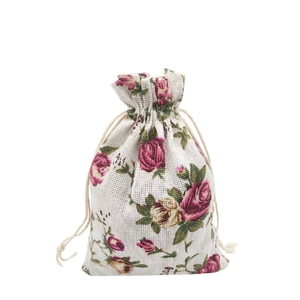 Pastoral drawstring cotton linen gift bag with vintage rose print on white background
