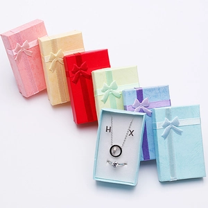 Set of colorful jewelry gift boxes with bow ribbons for rings and necklaces in six bright hues