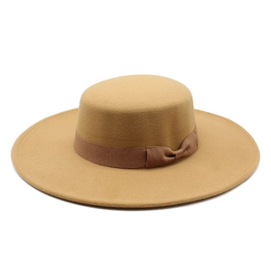 Elegant camel wool felt boater hat with a dark brown ribbon and side bow detail