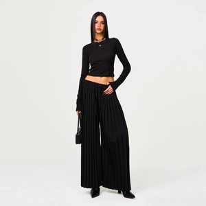 Women black long sleeve crop top with matching pleated wide leg trousers set