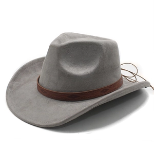 Western grey suede cowboy hat with brown ethnic embossed leather band in 45-degree view
