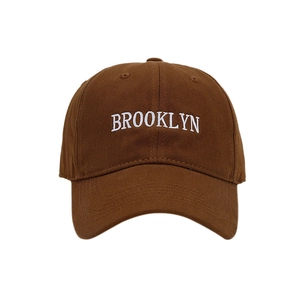 Brown Brooklyn embroidered baseball cap with cotton twill texture on white background
