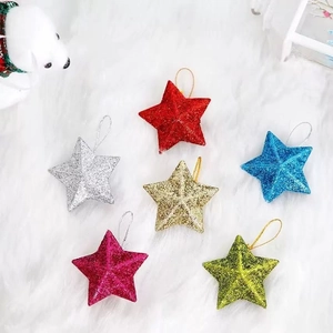 Colorful glittery star ornaments with hanging ropes for Christmas tree decorations
