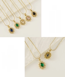 Detailed view of stainless steel sunflower pendants with colorful oval gemstones