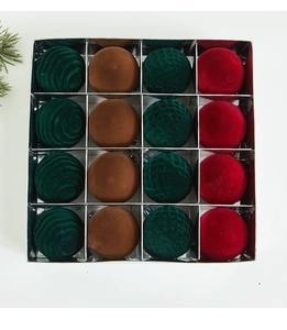 Detailed set of 16 flocked Christmas ornaments in green, brown, and red with velvet textures