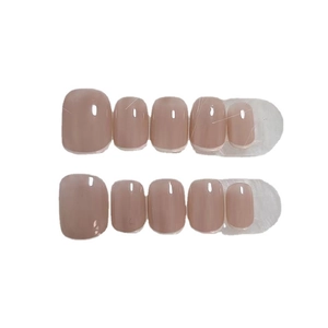 Glossy nude short press-on nails set with natural round shape on white background