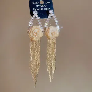Gold plated sterling silver flower tassel earrings with zircons and long metal chains