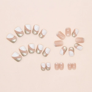 Detail of oatmeal nude press-on nails with silver glitter edges and geometric design