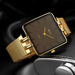 Detailed close-up of a luxury gold square quartz watch with stainless steel mesh strap