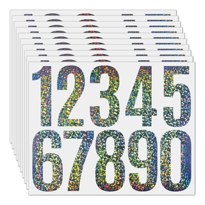 Macro shot of 3-inch laser holographic vinyl number stickers with colorful shiny finish