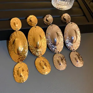 Vintage oversized gold and silver hammered metal oval drop earrings for women