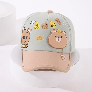 Detail of baby baseball cap with 3D baby lettering and cute bear embroidery patch