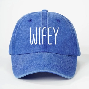 Detailed front view of washed blue denim baseball cap featuring white WIFEY embroidery